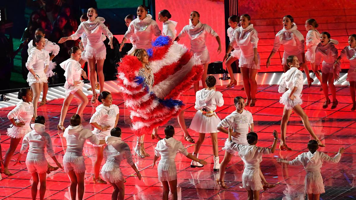 Jennifer Lopez Sings 'Born in the USA' While Draped in Puerto Rican Flag During Super Bowl Halftime
