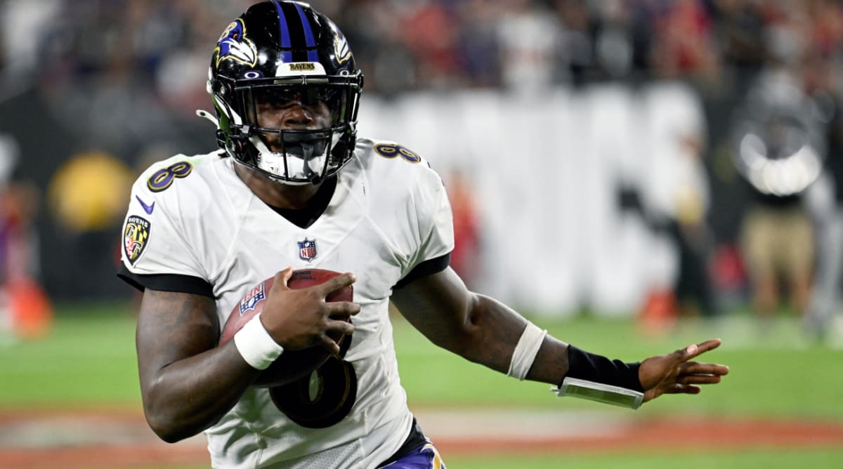 Lamar Jackson Holds Up ‘Pay ’Em Now’ Sign After Win Over Buccaneers