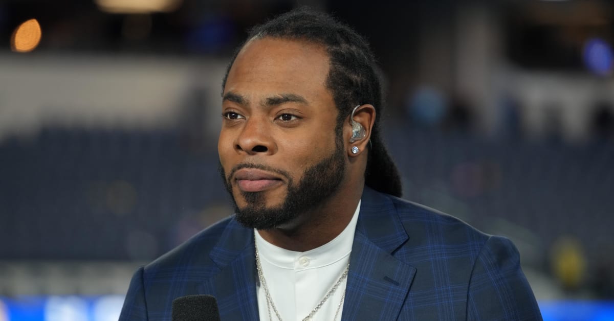 Michael Irvin and Keyshawn Johnson walk off set after Richard Sherman's