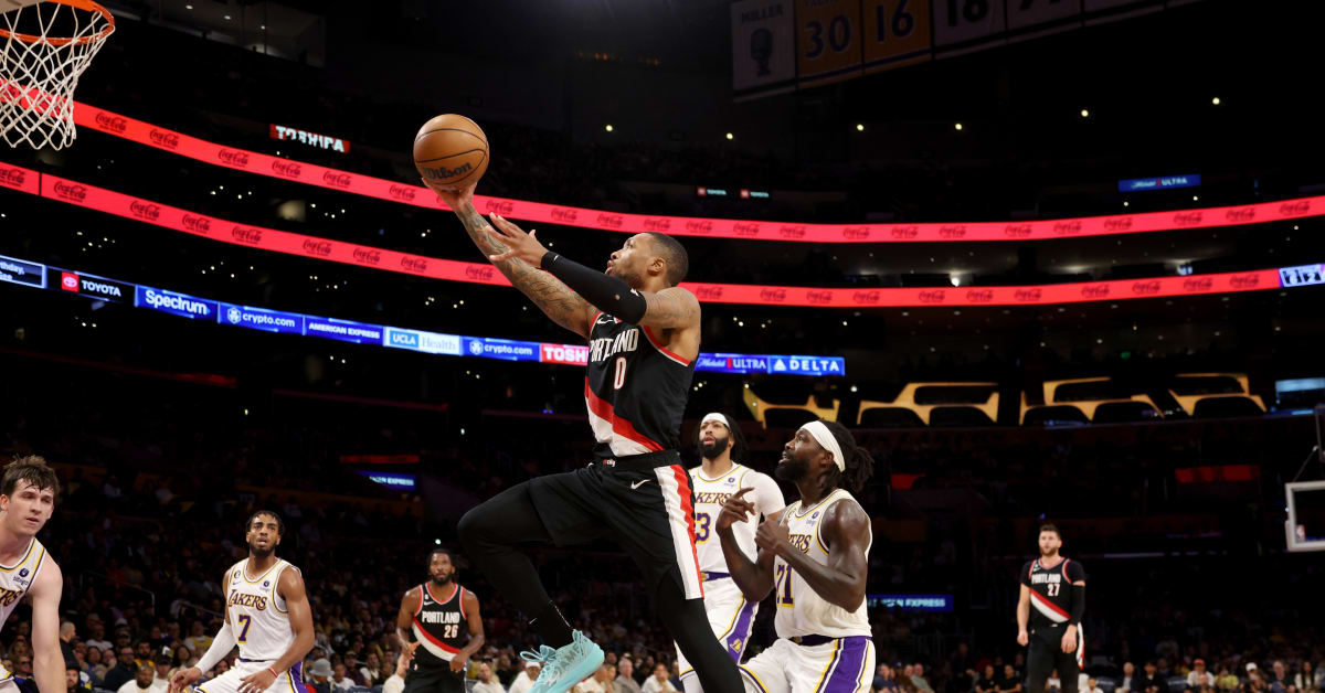 Los Angeles, United States. 23rd Oct, 2022. Los Angeles Lakers' forward  LeBron James (6) scores as he is fouled by Portland Trail Blazers' center  Just Nurkic (27) during the first half of