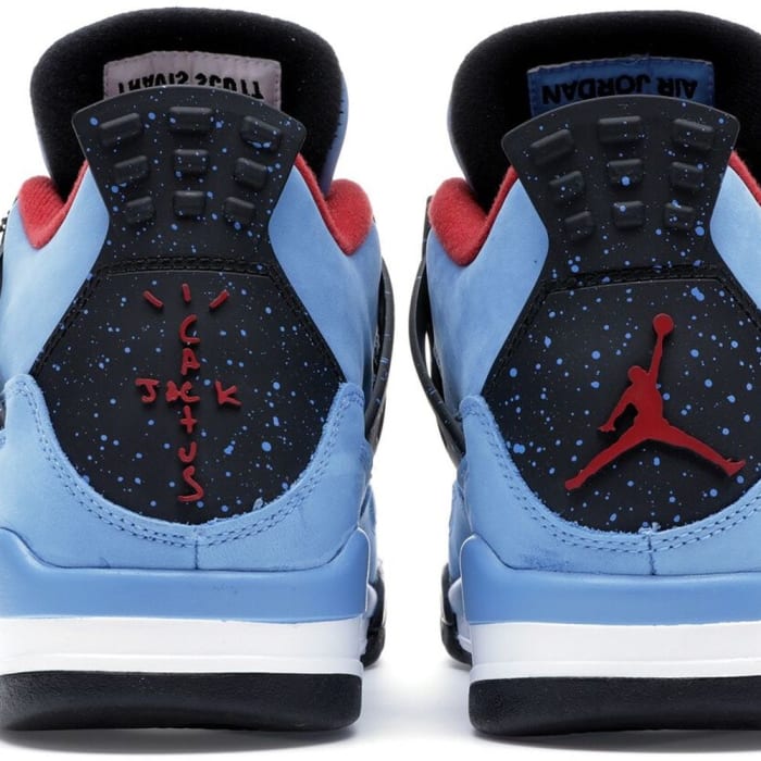 Rear view of blue and black Travis Scott x Air Jordan shoes.