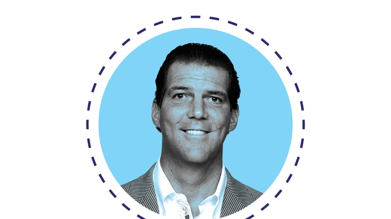 Steve Bisciotti Baltimore Ravens team players on the field