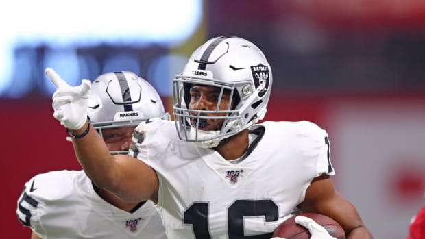 Oakland Raiders wide receiver Tyrell Williams (16) celebrates a first down catch against the Arizona Cardinals during a preseason game at State Farm Stadium.