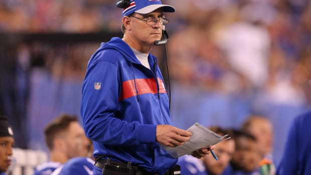 Sep 30, 2018; East Rutherford, NJ, USA; New York Giants offensive coordinator Mike Shula coaches against the New Orleans Saints during the fourth quarter at MetLife Stadium.