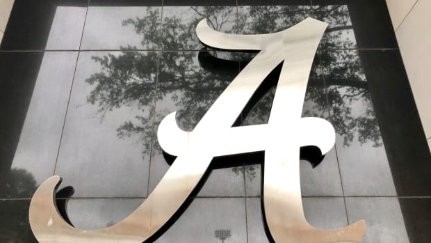 Alabama logo, black, football building reflected