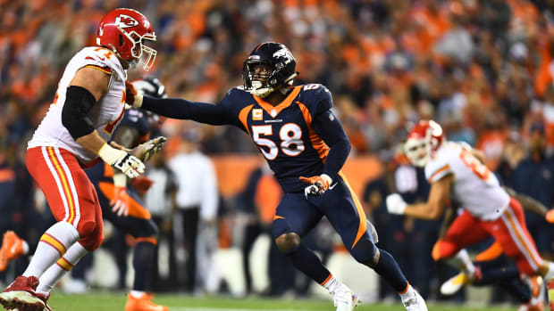 Oct 1, 2018; Denver, CO, USA; Kansas City Chiefs offensive tackle Mitchell Schwartz (71) pass blocks against Denver Broncos linebacker Von Miller (58) in the third quarter against the at Broncos Stadium at Mile High.