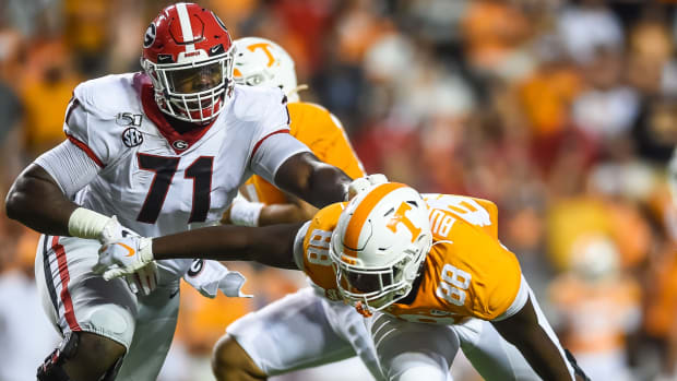 Oct 5, 2019; Knoxville, TN, USA; Georgia Bulldogs offensive lineman Andrew Thomas (71) blocking Tennessee Volunteers defensive lineman LaTrell Bumphus (88) during the first quarter at Neyland Stadium.