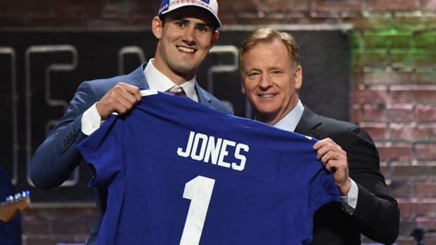 Apr 25, 2019; Nashville, TN, USA; Daniel Jones (Duke) is selected as the number six overall pick to the New York Giants and poses for a photo with NFL commissioner Roger Goodell during the 2019 NFL Draft in Downtown Nashville.