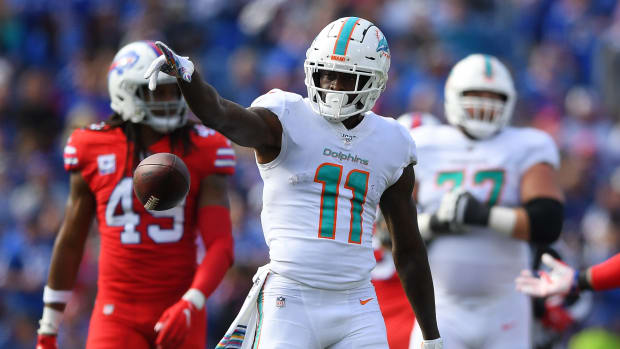 Oct 20, 2019; Orchard Park, NY, USA; Miami Dolphins wide receiver DeVante Parker (11) reacts to his first down catch against the Buffalo Bills during the third quarter at New Era Field. Mandatory Credit: Rich Barnes-USA TODAY Sports