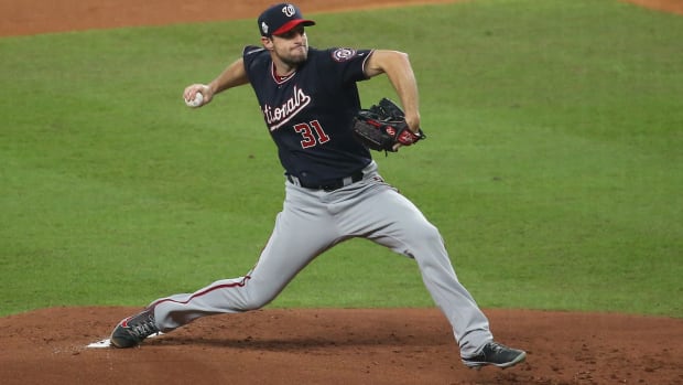 Mac Scherzer throws a pitch during Game 1 of the World Series between the Astros and Nationals.