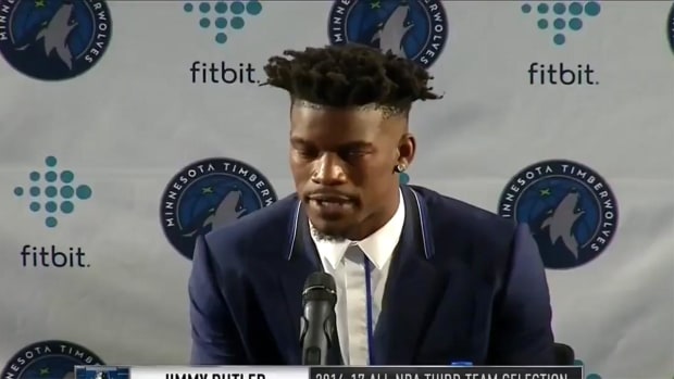  Jimmy Butler gives his number out at press conference--IMAGE