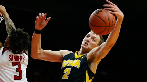 Jack Nunge (11) had 11 points in Iowa's exhibition game on Monday, his first game since taking a redshirt year last season.