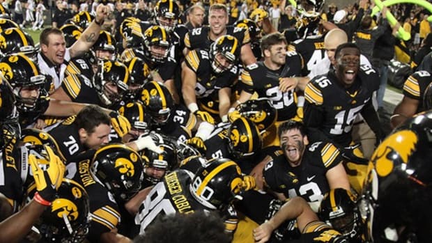 Paint the town pink: Iowa's unusual tactic of messing with its opponents