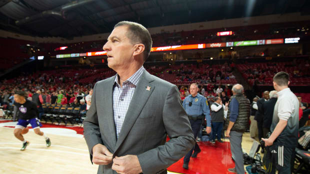 Maryland Terrapins head coach Mark Turgeon walks onto the court before the game against the Holy Cross Crusaders at XFINITY Center.