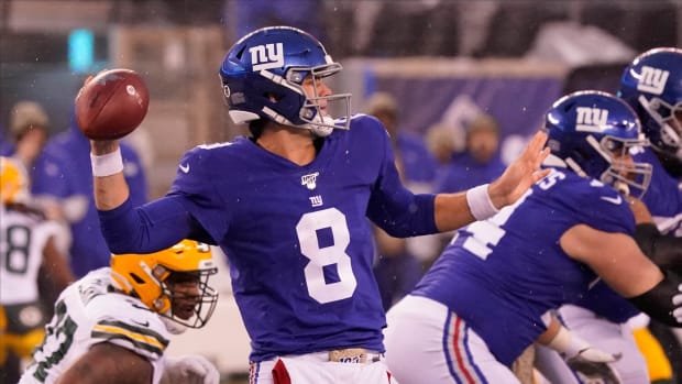 Dec 1, 2019; East Rutherford, NJ, USA; New York Giants quarterback Daniel Jones (8) throws in the 4th quarter against the Packers at MetLife Stadium.