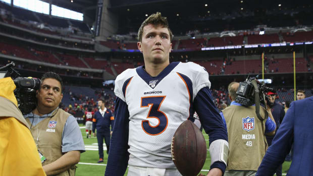 Denver Broncos quarterback Drew Lock (3) walks on the field after the game against the Houston Texans at NRG Stadium.