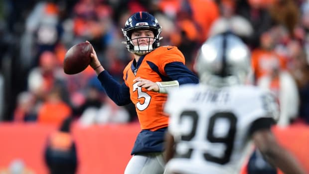 Denver Broncos quarterback Drew Lock (3) prepares to pass the ball in the second half against the Oakland Raiders at Empower Field at Mile High.