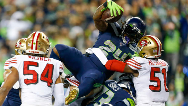 Seattle Seahawks running back Marshawn Lynch (24) rushes for a touchdown against the San Francisco 49ers during the fourth quarter at CenturyLink Field