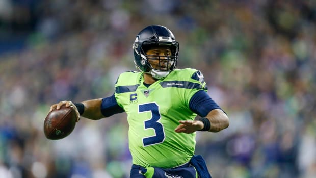 Seattle Seahawks quarterback Russell Wilson (3) passes against the Minnesota Vikings during the second quarter at CenturyLink Field.