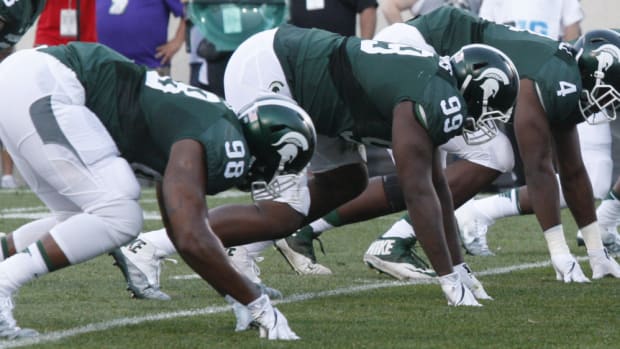 Raequan Williams, Demetrious Cooper, Malik McDowell on the DL for MSU vs. Furman 2016.  Photo courtesy of Starr Portice.