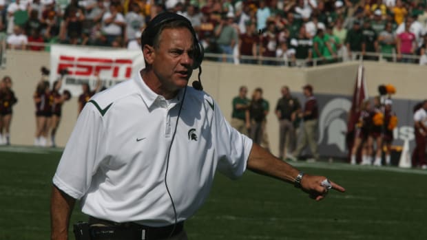With a total of 45 offers already for 2011 and 16 Prospects on Campus this Weekend, Dantonio is making a big push!  Photo courtesy of Bill Marklevits.
