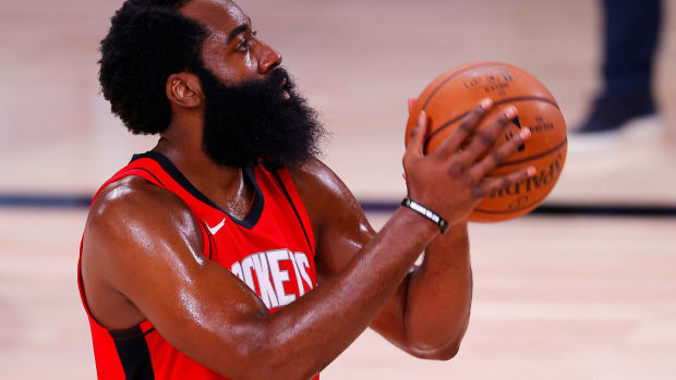 Aug 2, 2020; Lake Buena Vista, USA; James Harden #13 of the Houston Rockets shoots against the Milwaukee Bucks at The Arena at ESPN Wide World Of Sports Complex on August 02, 2020 in Lake Buena Vista, Florida.