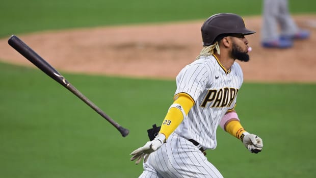 Aug 3, 2020; San Diego, California, USA; San Diego Padres shortstop Fernando Tatis Jr. (23) tosses his bat after hitting a home run during the fifth inning against the Los Angeles Dodgers at Petco Park. Mandatory Credit: Orlando Ramirez-USA TODAY Sports
