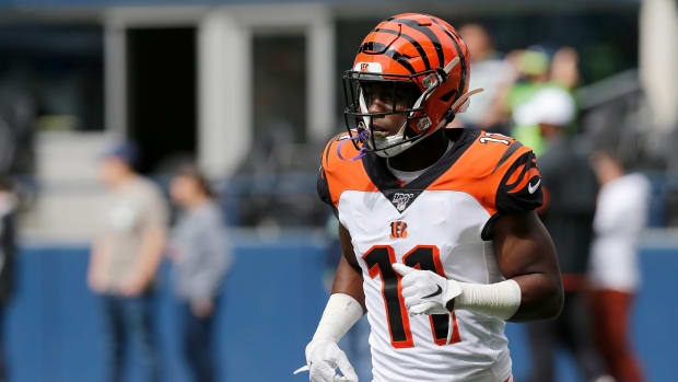 Cincinnati Bengals wide receiver John Ross (11) runs drills during warmups before the first quarter of the NFL Week 1 game between the Seattle Seahawks and the Cincinnati Bengals at CenturyLink Field in Seattle on Sunday, Sept. 8, 2019. Cincinnati Bengals At Seattle Seahawks