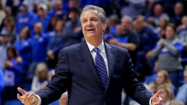 John Calipari gestures during a Kentucky game.