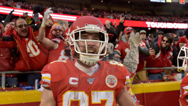 Jan 12, 2020; Kansas City, Missouri, USA; Kansas City Chiefs tight end Blake Bell (81) and tight end Travis Kelce (87) celebrate with fans after Bell s touchdown during the AFC Divisional Round playoff football game against the Houston Texans at Arrowhead Stadium. Mandatory Credit: Denny Medley-USA TODAY Sports