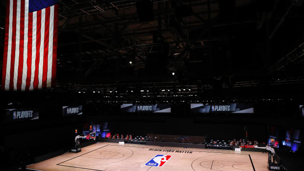 An empty court and bench is shown with no signage following the scheduled start time in Game Five of the Eastern Conference First Round between the Milwaukee Bucks and the Orlando Magic