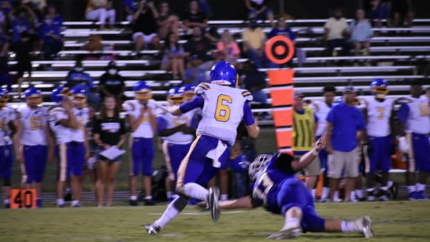 Ty Simpson escapes McNairy Central defender.