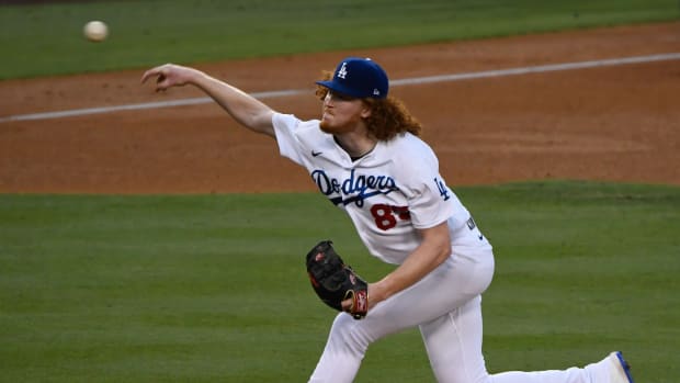 Aug 22, 2020; Los Angeles, California, USA; Los Angeles Dodgers starting pitcher Dustin May (85) throws in the third inning in the Dodgers 4-3 win over the Colorado Rockies at Dodger Stadium. Mandatory Credit: Robert Hanashiro-USA TODAY Sports