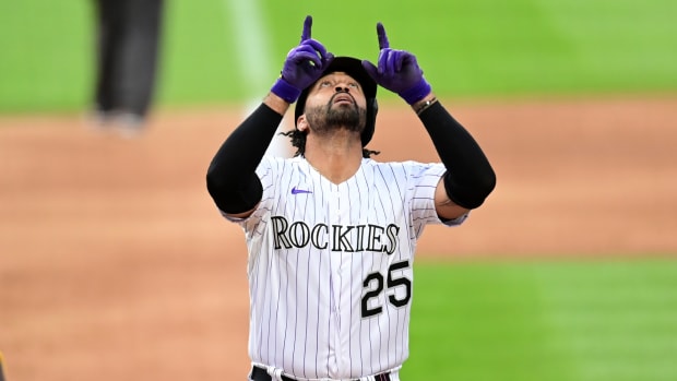 Aug 1, 2020; Denver, Colorado Rockies designated hitter Matt Kemp (25) celebrates his solo home run in the fourth inning against the San Diego Padres at Coors Field. Mandatory Credit: Ron Chenoy-USA TODAY Sports
