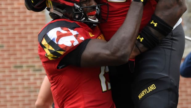 Oct 1, 2016; College Park, MD, USA; Maryland Terrapins wide receiver Teldrick Morgan (19) celebrates with offensive lineman Derwin Gray (55) after scoring a touchdown during the third quarter against the Purdue Boilermakers at Byrd Stadium. Mandatory Credit: Tommy Gilligan-USA TODAY Sports