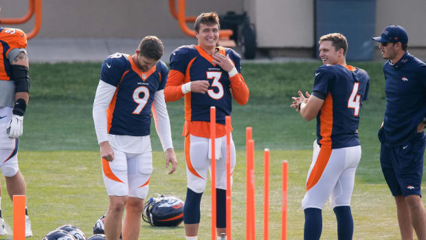 Denver Broncos quarterback Drew Lock (3) and quarterback Jeff Driskel (9) and quarterback Brett Rypien (4) during training camp at the UCHealth Training Center.