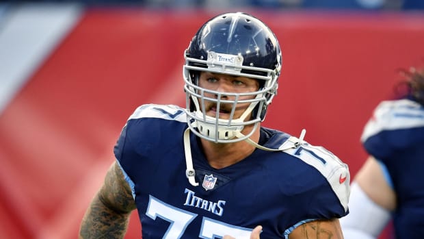 Here, Tennessee Titans offensive tackle Lewan (77) takes the field before the start of their preseason game against the Tampa Bay Buccaneers at Nissan Stadium Aug. 18, 2018.