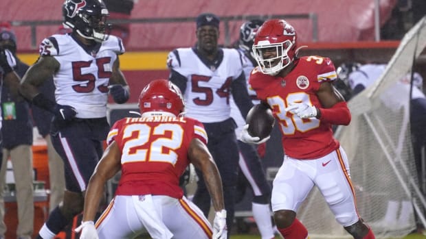 Sep 10, 2020; Kansas City, Missouri, USA; Kansas City Chiefs safety L'Jarius Sneed (38) celebrates with safety Juan Thornhill (22) after intercepting during the game against the Houston Texans at Arrowhead Stadium. Mandatory Credit: Denny Medley-USA TODAY Sports