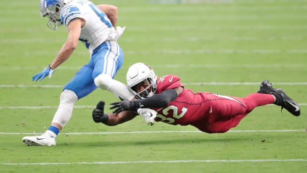 Arizona Cardinals strong safety Budda Baker (32) misses a tackle on Detroit Lions wide receiver Danny Amendola (80) during the first quarter at State Farm Stadium Sept. 27, 2020.