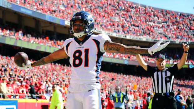 Denver Broncos wide receiver Tim Patrick (81) celebrates after scoring a touchdown against the Kansas City Chiefs in the first half at Arrowhead Stadium.