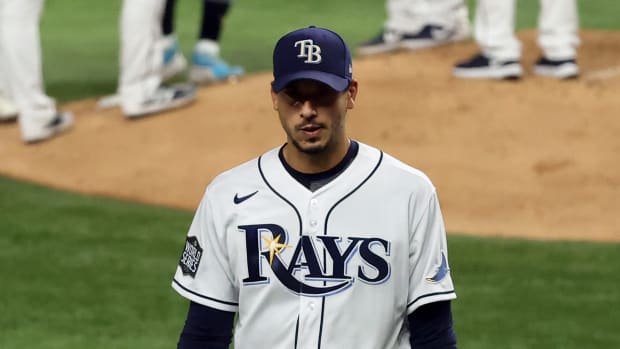 Tampa Bay Rays starting pitcher Charlie Morton (50) walks to the dugout after being removed form the game against the Los Angeles Dodgers during the fifth inning of game three of the 2020 World Series