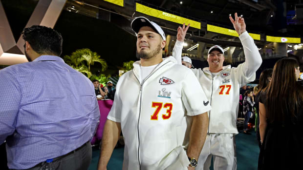 Jan 27, 2020; Miami, FL, USA; Kansas City Chiefs offensive guard Nick Allegretti (73) and Kansas City Chiefs offensive guard Andrew Wylie (77) during Super Bowl LIV Opening Night at Marlins Park. Mandatory Credit: Douglas Defelice-USA TODAY Sports