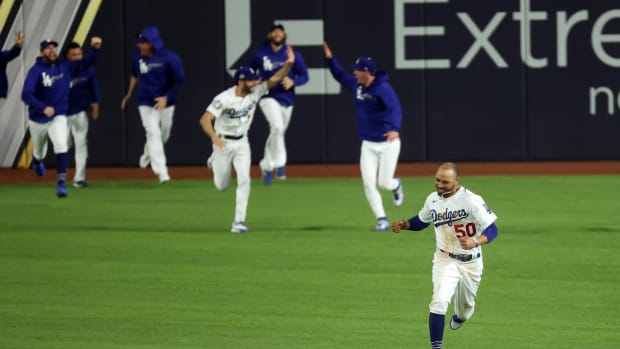 Oct 27, 2020; Arlington, Texas, USA; Los Angeles Dodgers right fielder Mookie Betts (50) celebrates winning the World Series against the Tampa Bay Rays after game six of the 2020 World Series at Globe Life Field. Mandatory Credit: Kevin Jairaj-USA TODAY Sports