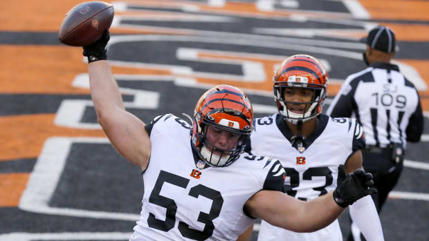 Nov 1, 2020; Cincinnati, Ohio, USA; Cincinnati Bengals center Billy Price (53) spikes the football after a touchdown by running back Giovani Bernard (not pictured) against the Tennessee Titans during the fourth quarter at Paul Brown Stadium. Mandatory Credit: Joseph Maiorana-USA TODAY Sports
