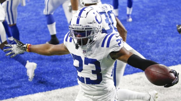 Indianapolis Colts nickel cornerback Kenny Moore II celebrates his first career pick-six in the fourth quarter of Sunday's 41-21 road win over the Detroit Lions.