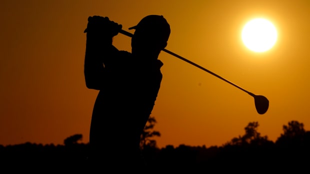 Tiger Woods plays his shot from the tenth tee during the second round of The Masters golf tournament