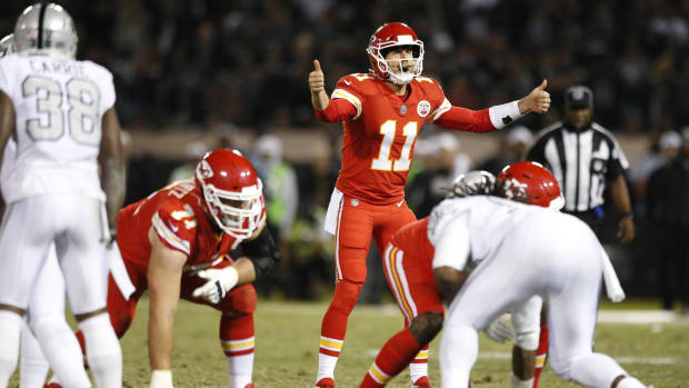 Oct 19, 2017; Oakland, CA, USA; Kansas City Chiefs quarterback Alex Smith (11) calls a play against the Oakland Raiders in the third quarter at Oakland Coliseum. The Raiders defeated the Chiefs 31-30. Mandatory Credit: Cary Edmondson-USA TODAY Sports