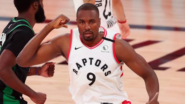 Toronto Raptors center Serge Ibaka (9) reacts after making a basket