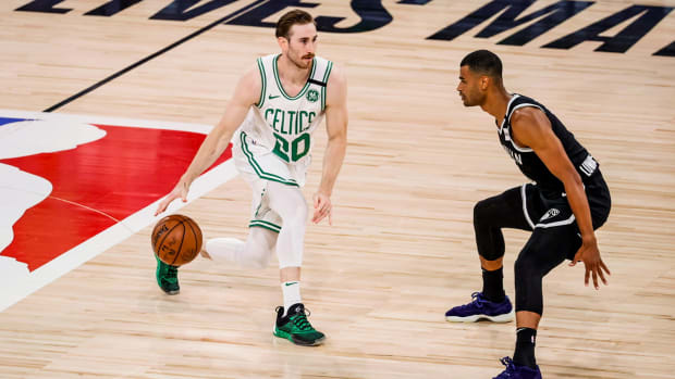 Gordon Hayward dribbles up the court in the NBA bubble