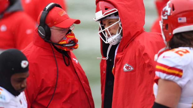 Oct 25, 2020; Denver, Colorado, USA; Kansas City Chiefs head coach Andy Reid speaks to quarterback Patrick Mahomes (15) in the first half against the Denver Broncos at Empower Field at Mile High. Mandatory Credit: Ron Chenoy-USA TODAY Sports